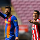 Gerard Pique of FC Barcelona and Luis Suarez of Atletico de Madrid during the La Liga Santander match between FC Barcelona and Atletico de Madrid at Camp Nou on May 08, 2021 in Barcelona, Spain.